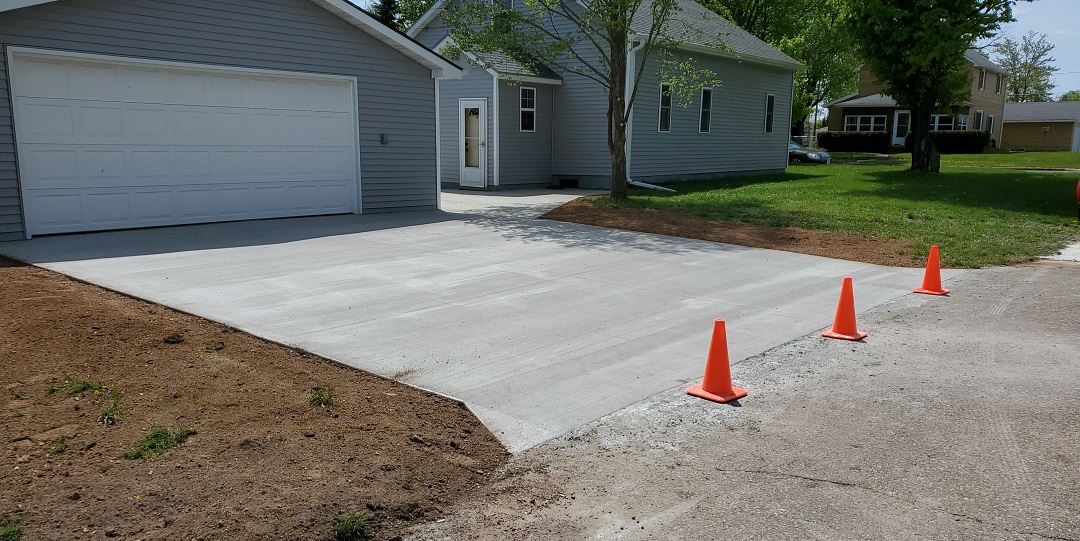 Concrete driveway installation by RK Masonry Services in Weston, WI